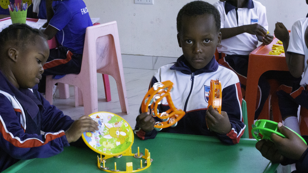 Children exploring musical instruments