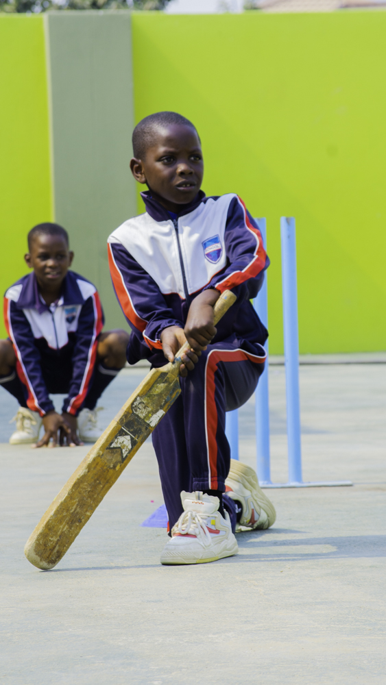 Young learner practising cricket